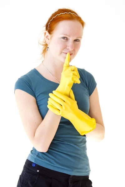 Pelirroja joven con guantes amarillos —  Fotos de Stock