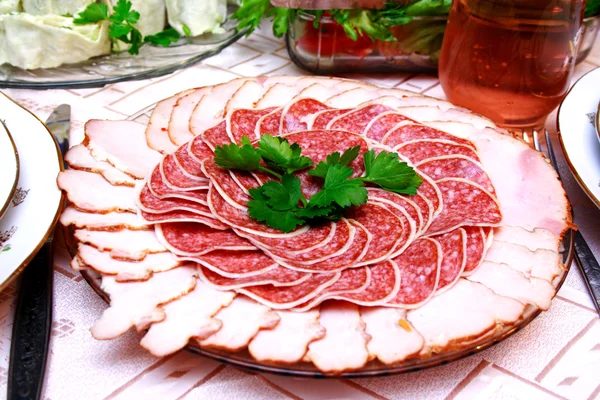 stock image Salami slices on the table