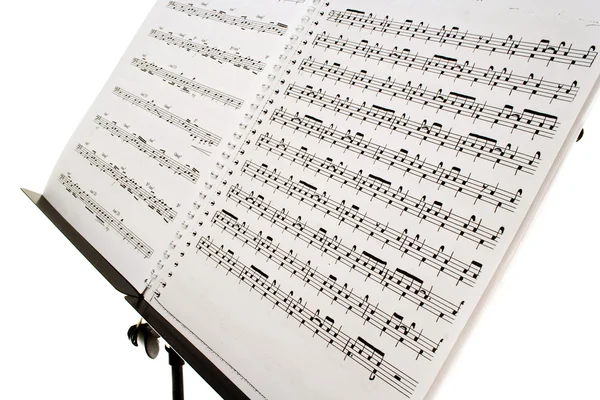 Hoja de notas musicales aislada en blanco —  Fotos de Stock