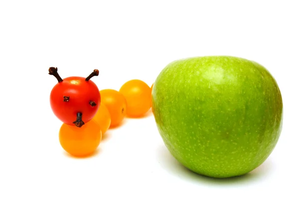 Tomato caterpillar with a green apple — Stock Photo, Image