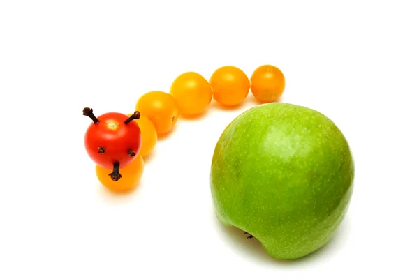 Tomato caterpillar with a green apple — Stock Photo, Image