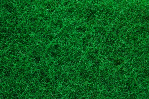 stock image Green abrasive sponge texture background