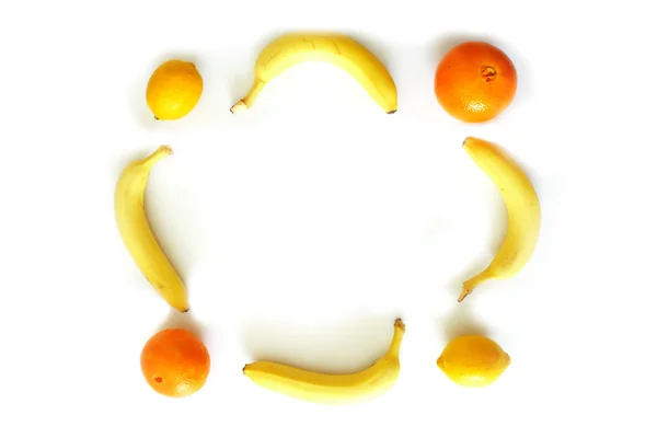 Limão, bananas, moldura de foto laranja — Fotografia de Stock
