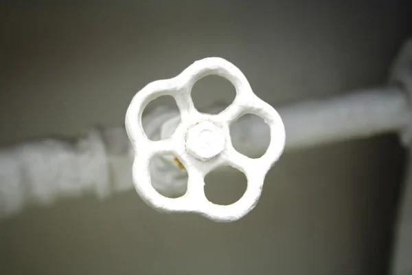 Old white radiator valve close up — Stock Photo, Image
