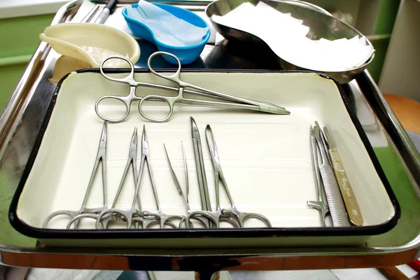 Surgical instruments in a steel tray — Stock Photo, Image
