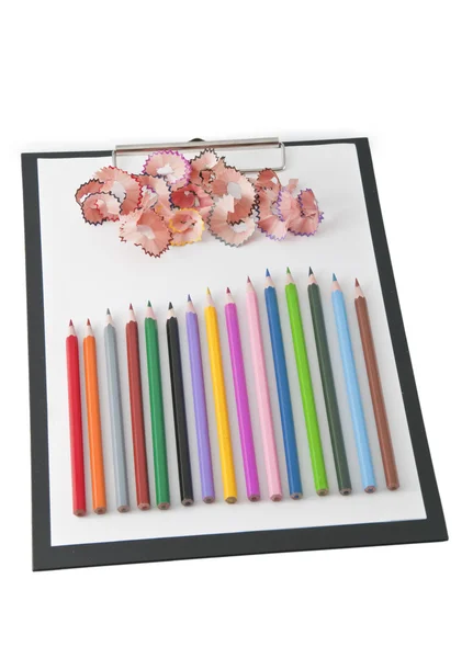 Portapapeles para escribir con lápices de colores — Foto de Stock