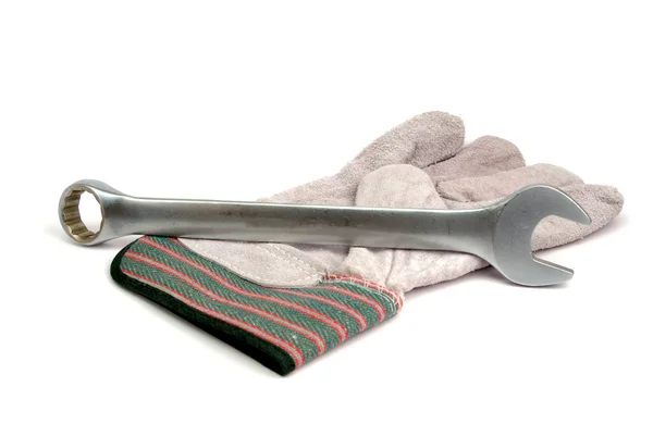 Wrench and glove — Stock Photo, Image