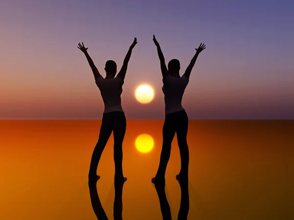 Two girls dancing in the sunrise for freedom — Stock Photo, Image