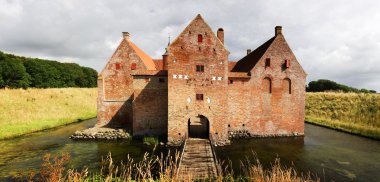 Castle with moat in Denmark clipart