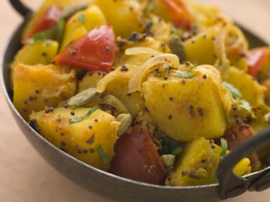 Pan of Bombay Aloo - Curried Potatoes clipart