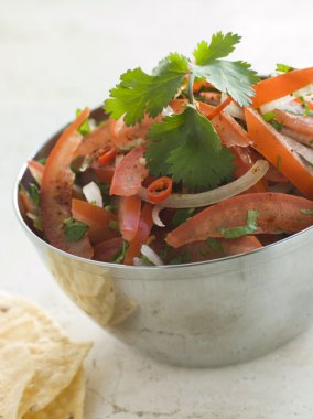 Dish of Tomato Red Onion and Coriander Relish clipart