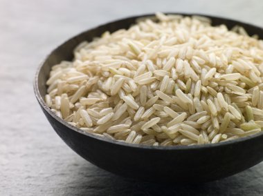 Bowl of Uncooked Basmati Rice clipart
