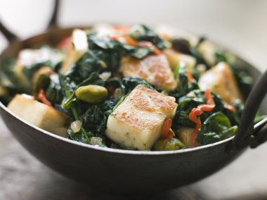 Close up image of Karai Dish with Spinach and fried Paneer clipart