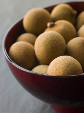 Close up of Longan in Wooden Bowl clipart