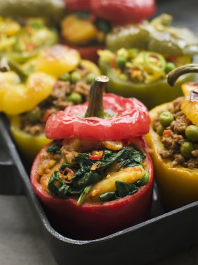 Bell Peppers stuffed with Keema Sag Aloo and Vegetable Pilau clipart