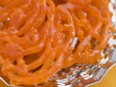 Plate of Jalebi clipart