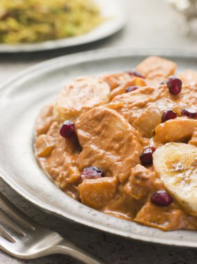 Chicken Kashmiri on a Pewter Plate with Pilau Rice clipart