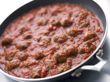 Pan of Meatballs in a Tomato Sauce clipart