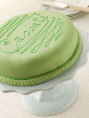 Close up of whole Cassata Cake on stand clipart