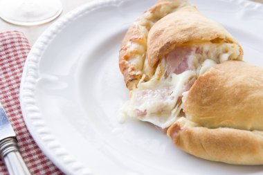 Spinach Tomato and Goats Cheese Calzone clipart