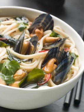 Mussels and Udon Noodles in Chili Soy Broth clipart