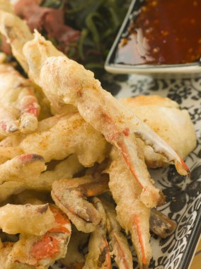 Tempura of Soft Shell Crab with Chili Sauce and Seaweed salad clipart