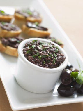 Black Tapenade on Toasts clipart