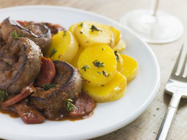 Lambs Kidney Chorizo Sausage and Sherry Sauce clipart