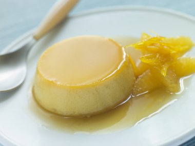 Flan de Naranja- Orange Custards clipart