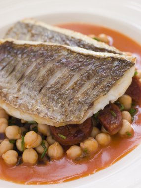 Fillets of Sea Bream with Chorizo Sausage Chickpeas and Tomato S clipart