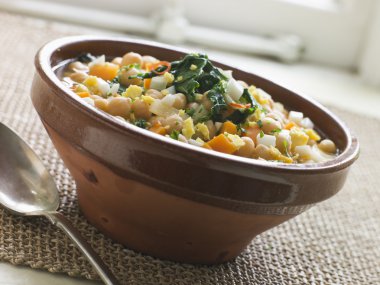 Bowl of Silverbeet and Chickpea Broth clipart