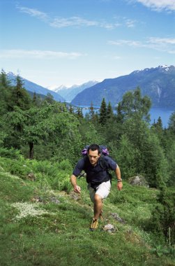 Man hiking in the great outdoors, clipart