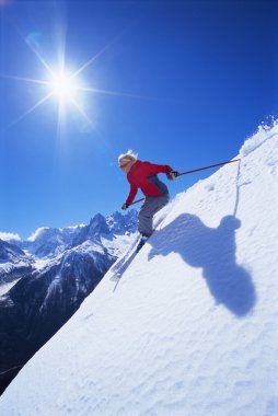 Young woman skiing clipart