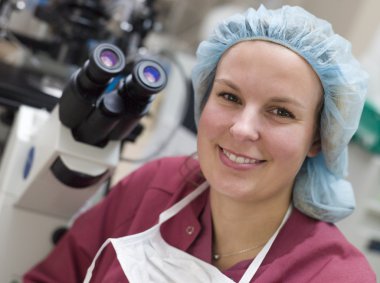 Portrait of embryologist in laboratory clipart