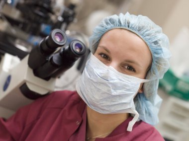 Portrait of embryologist wearing mask clipart