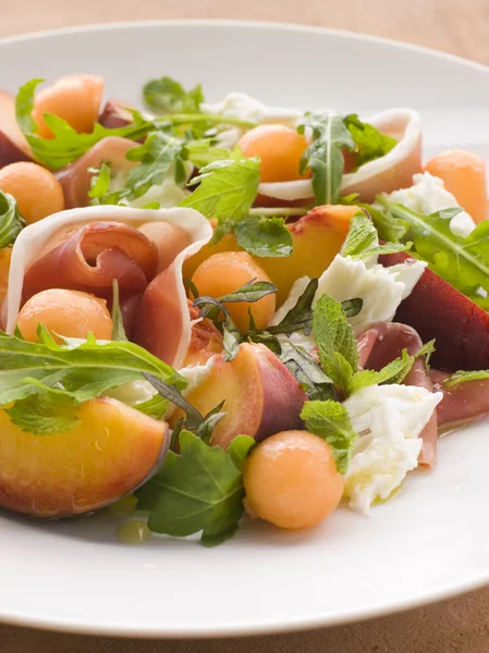 stock image Platter of Cantaloupe Melon Parma Ham Mozzarella Cheese and Peac