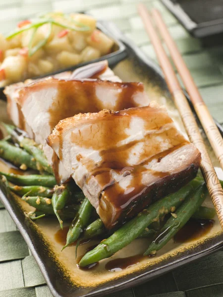 Roast Belly Pork with Fuji Apples and Peanut Beans — Stock Photo, Image