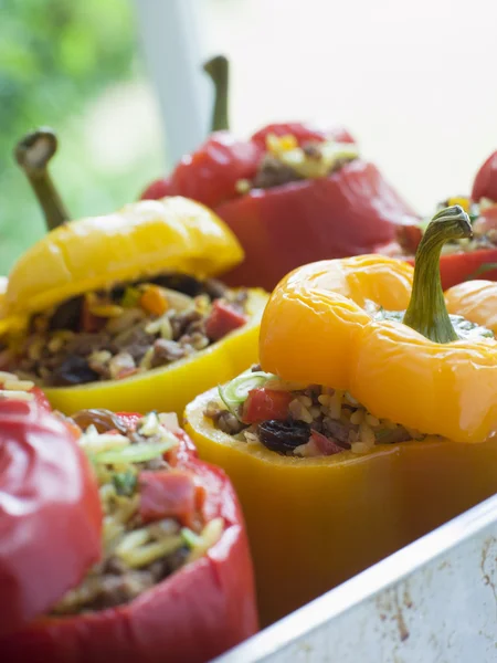 Bell Peppers stuffed with Spiced Rice and Dried Fruits — Stock Photo, Image