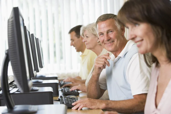 Adult students in a computer lab — Stock Photo, Image