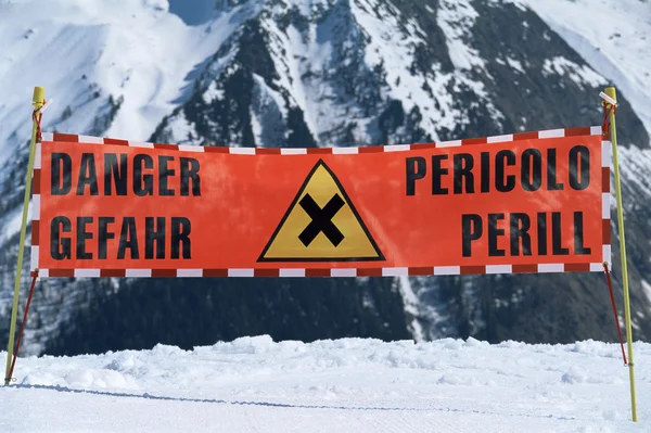 stock image Warning sign in a snow covered area