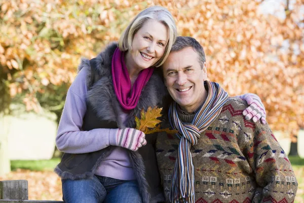 Affectionate senior couple on autumn walk — Stock Photo, Image
