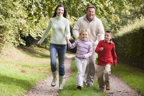 Family Running Woodland Track Autumn — Stock Photo, Image