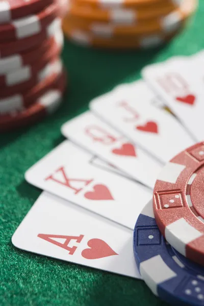 Winning hand of cards on casino table — Stock Photo, Image