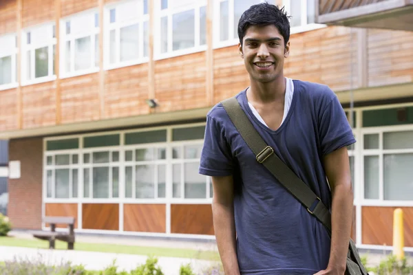 Male college student on campus — Stock Photo, Image