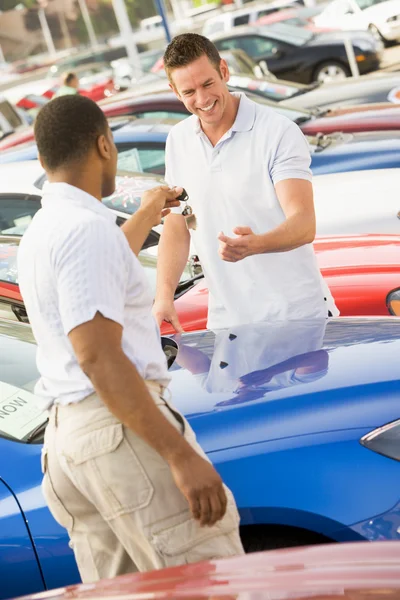Man Collecting New Car Dealer — Stock Photo, Image