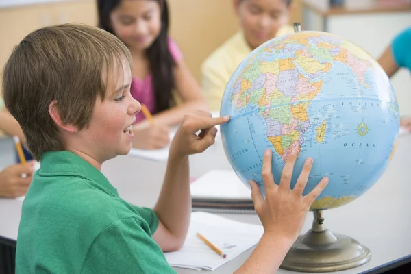 stock image Elementary school geography class with globe