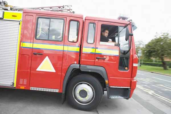 Fire Engine Leaving Fire Station — Stock Photo, Image