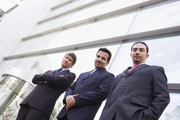 Group of businessmen outside office building — Stock Photo, Image