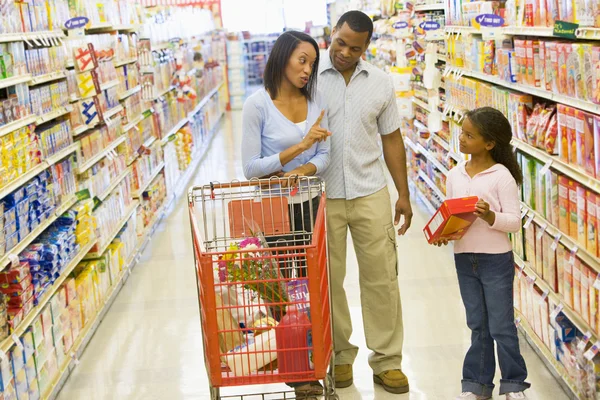 Family having disagreement in supermarket Stock Image