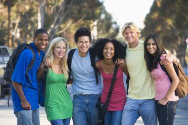 Group of six young firneds having fun outside clipart